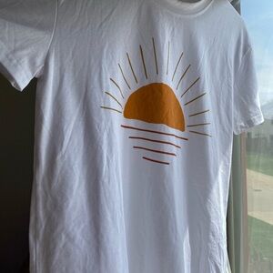 White T-Shirt with Orange Sun Design
